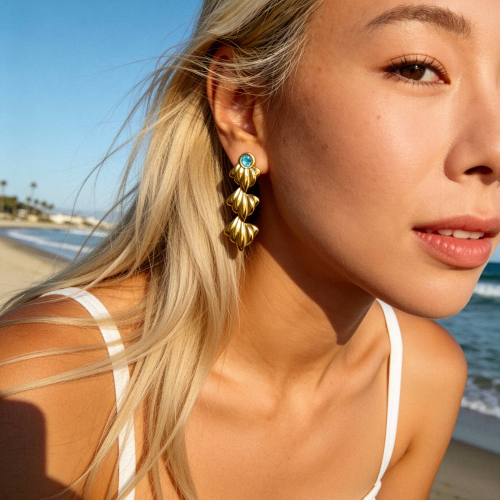 Gold Ocean Leaf Earrings with Blue Crystal