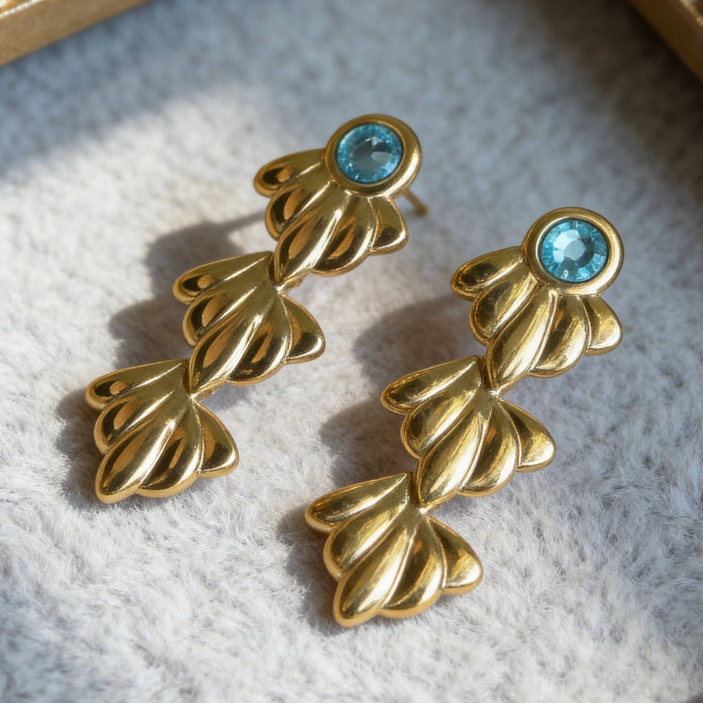 Gold Ocean Leaf Earrings with Blue Crystal