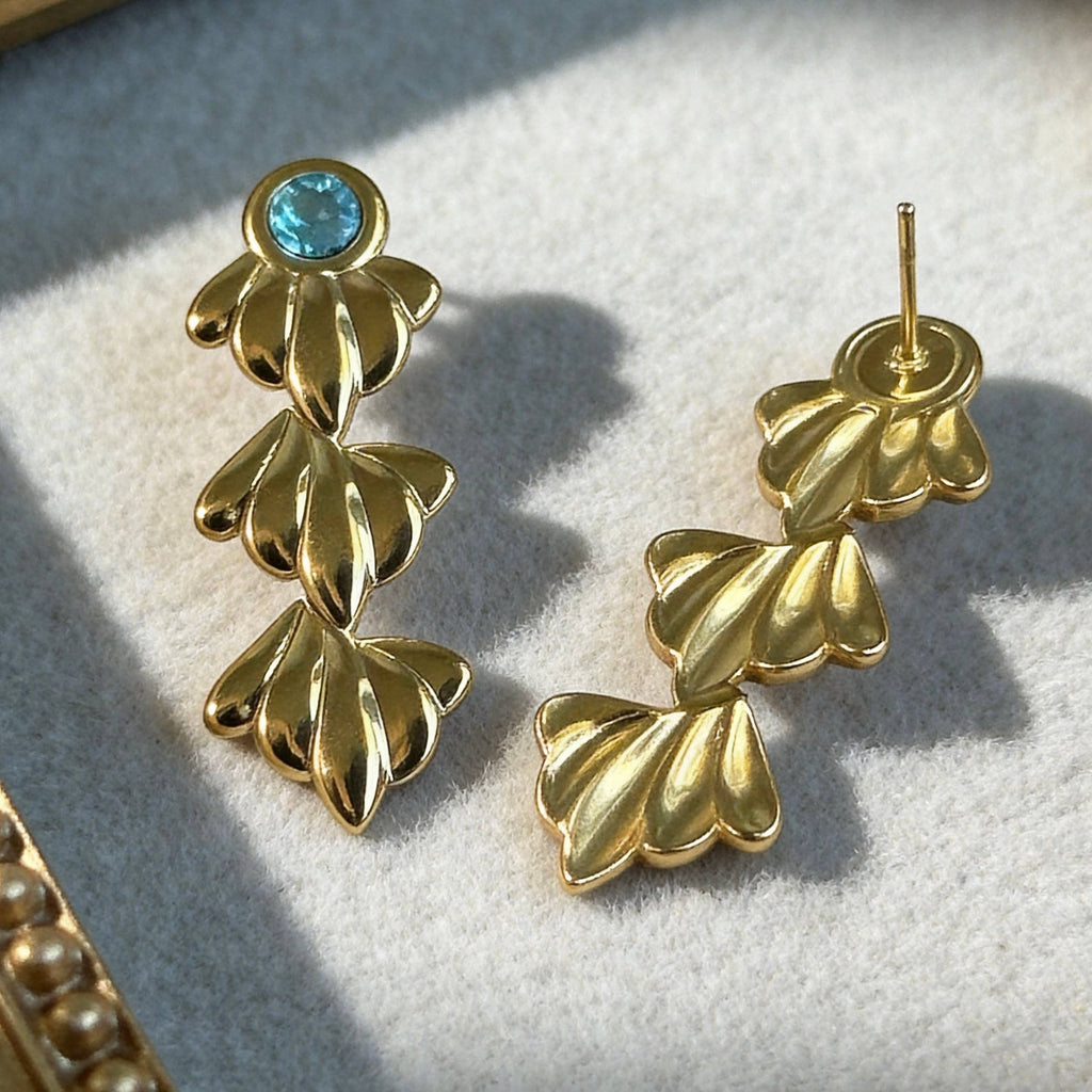 Gold Ocean Leaf Earrings with Blue Crystal